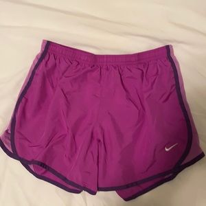 Purple Nike shorts